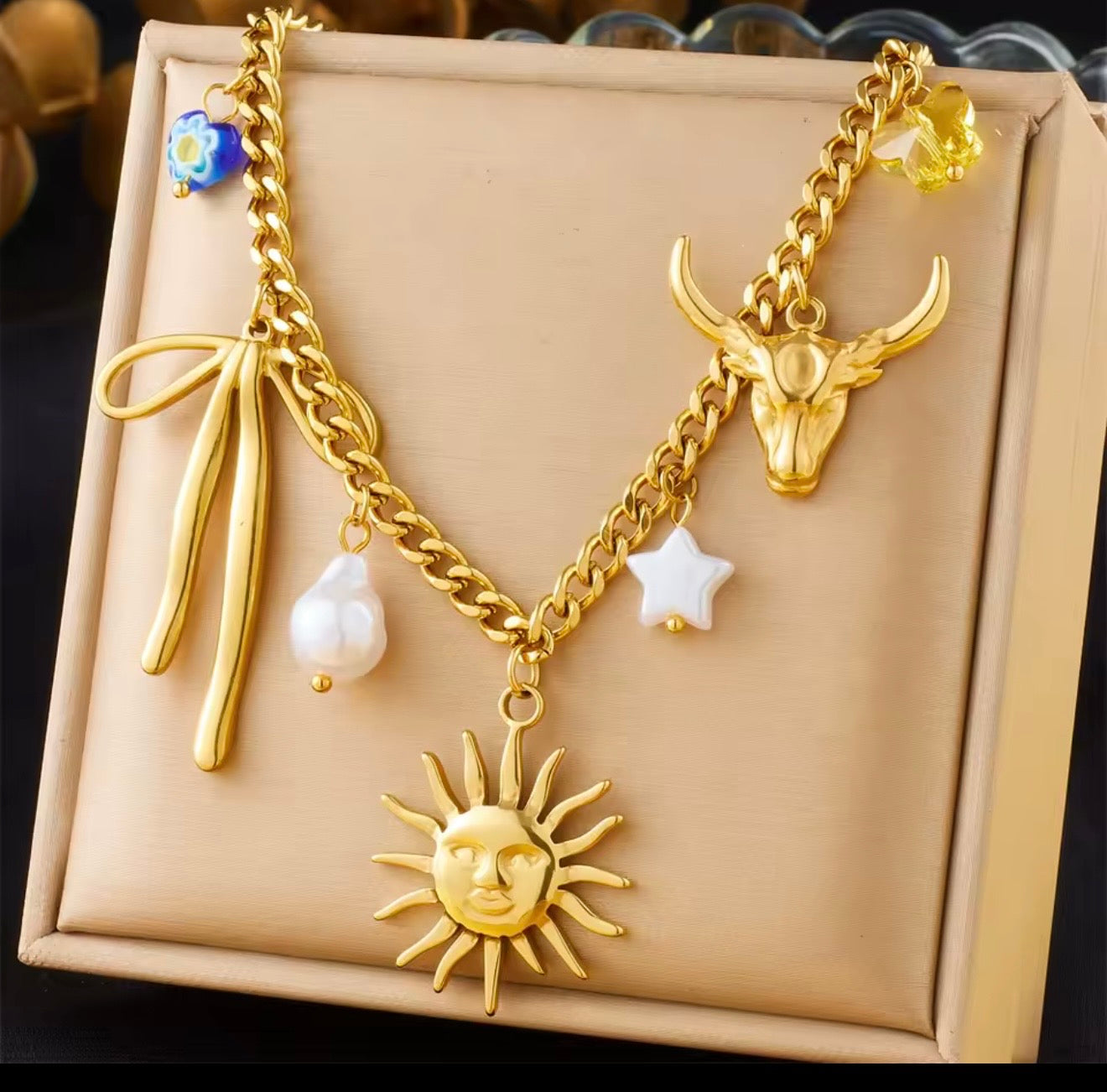 Collares  de acero inoxidable  con dijes de sol,luna,ojo,perlas,