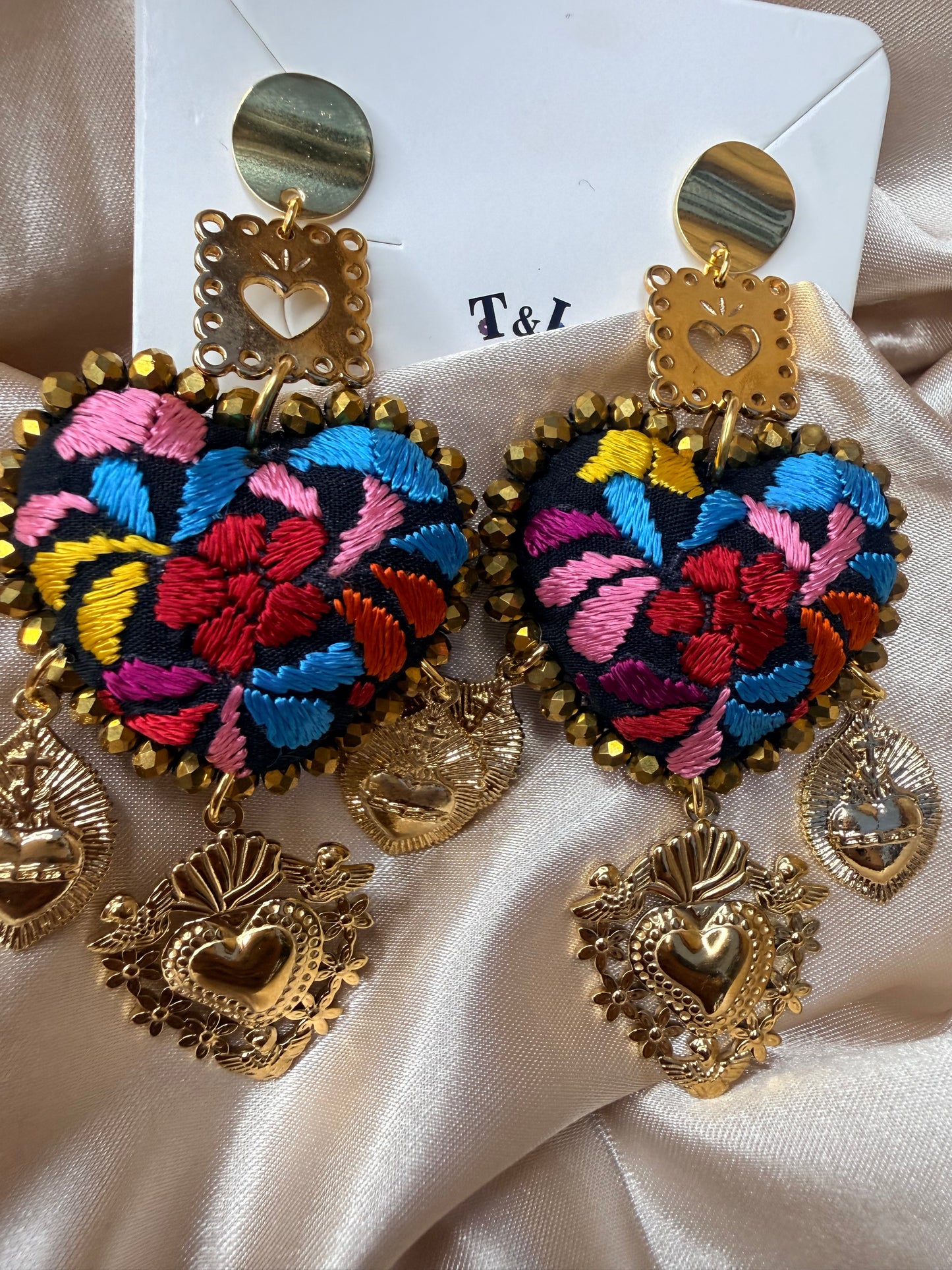 Aretes Bordados a Mano :Naranja – Cristales Dorados, Sagrado Corazón y Papel Picado/ hand made jewelry
