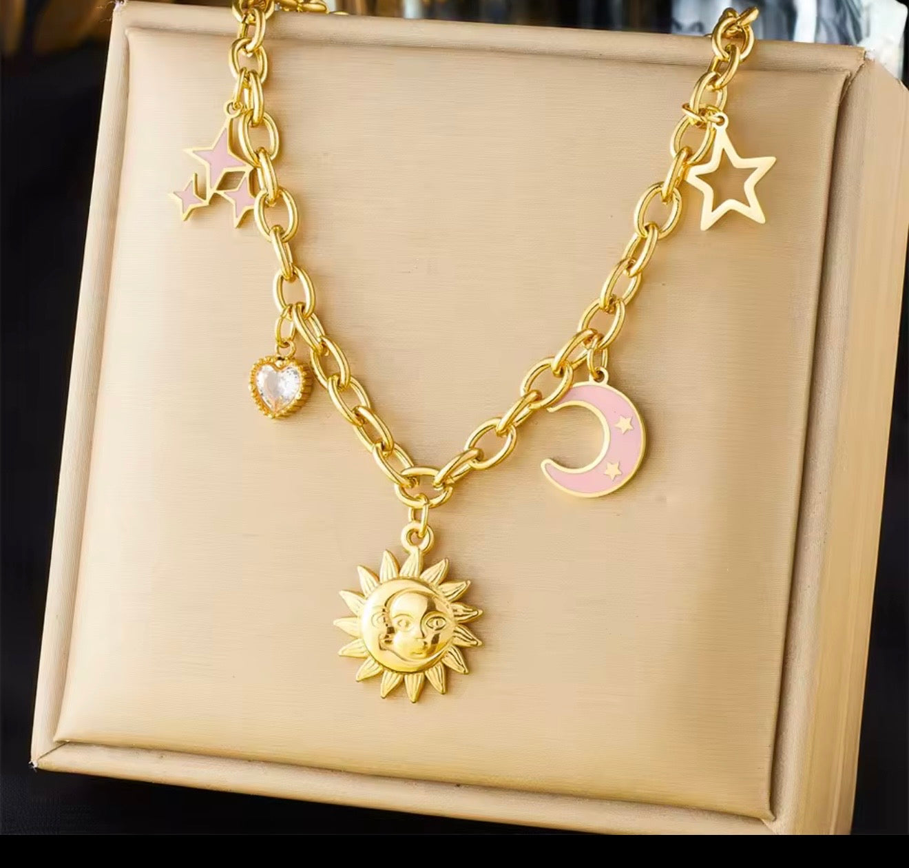 Collares  de acero inoxidable  con dijes de sol,luna,ojo,perlas,