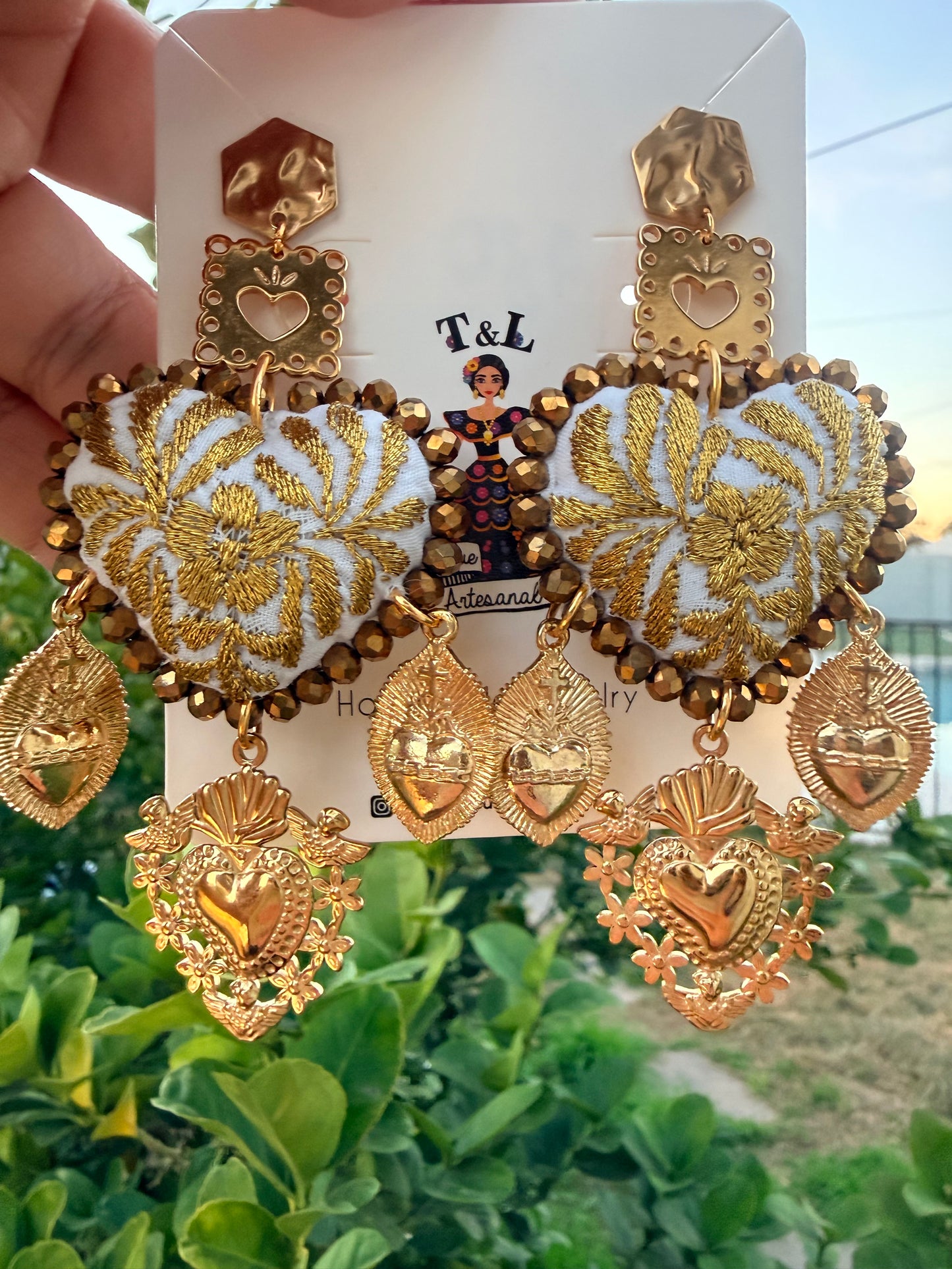 Aretes Bordados a Mano :Naranja – Cristales Dorados, Sagrado Corazón y Papel Picado/ hand made jewelry