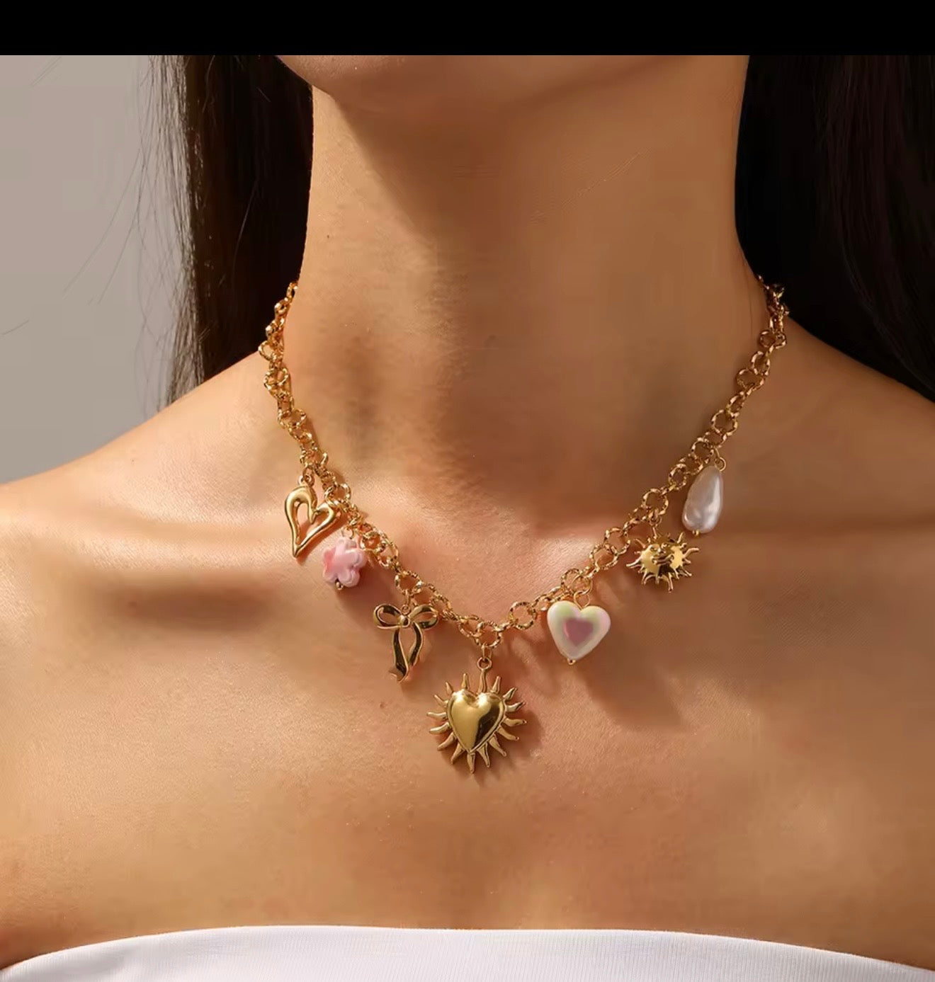 Collares  de acero inoxidable  con dijes de sol,luna,ojo,perlas,