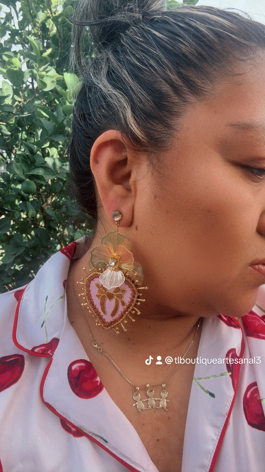 Aretes bordado a mano/herradura /moño