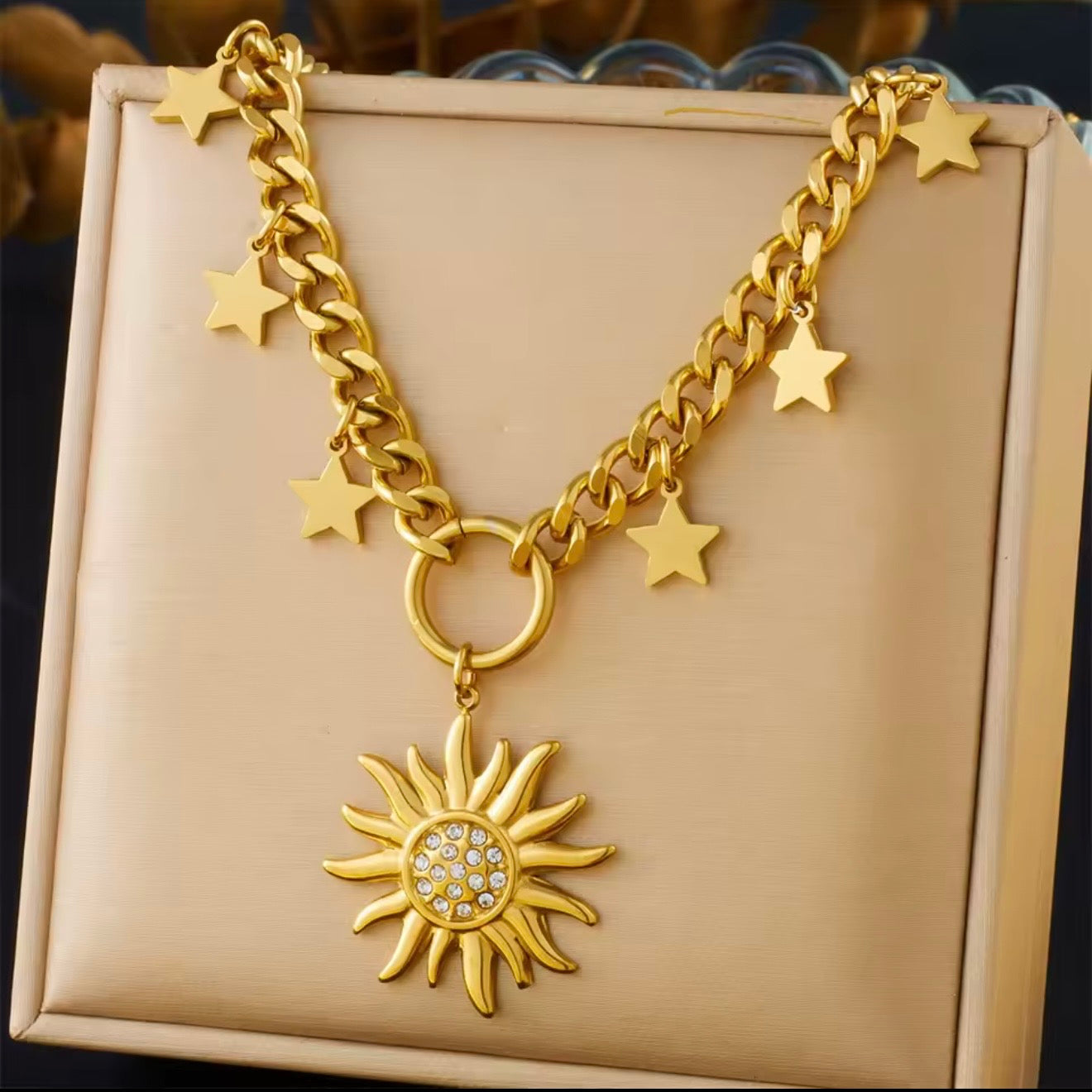 Collares  de acero inoxidable  con dijes de sol,luna,ojo,perlas,