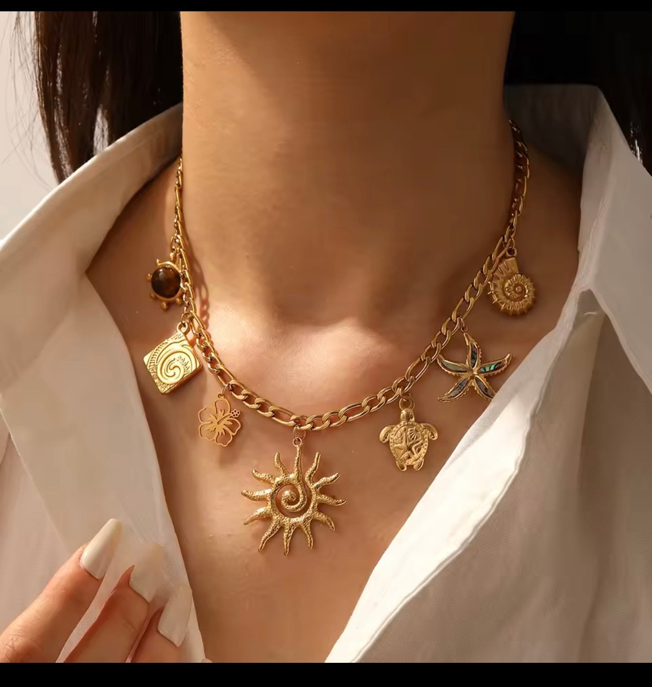 Collares  de acero inoxidable  con dijes de sol,luna,ojo,perlas,