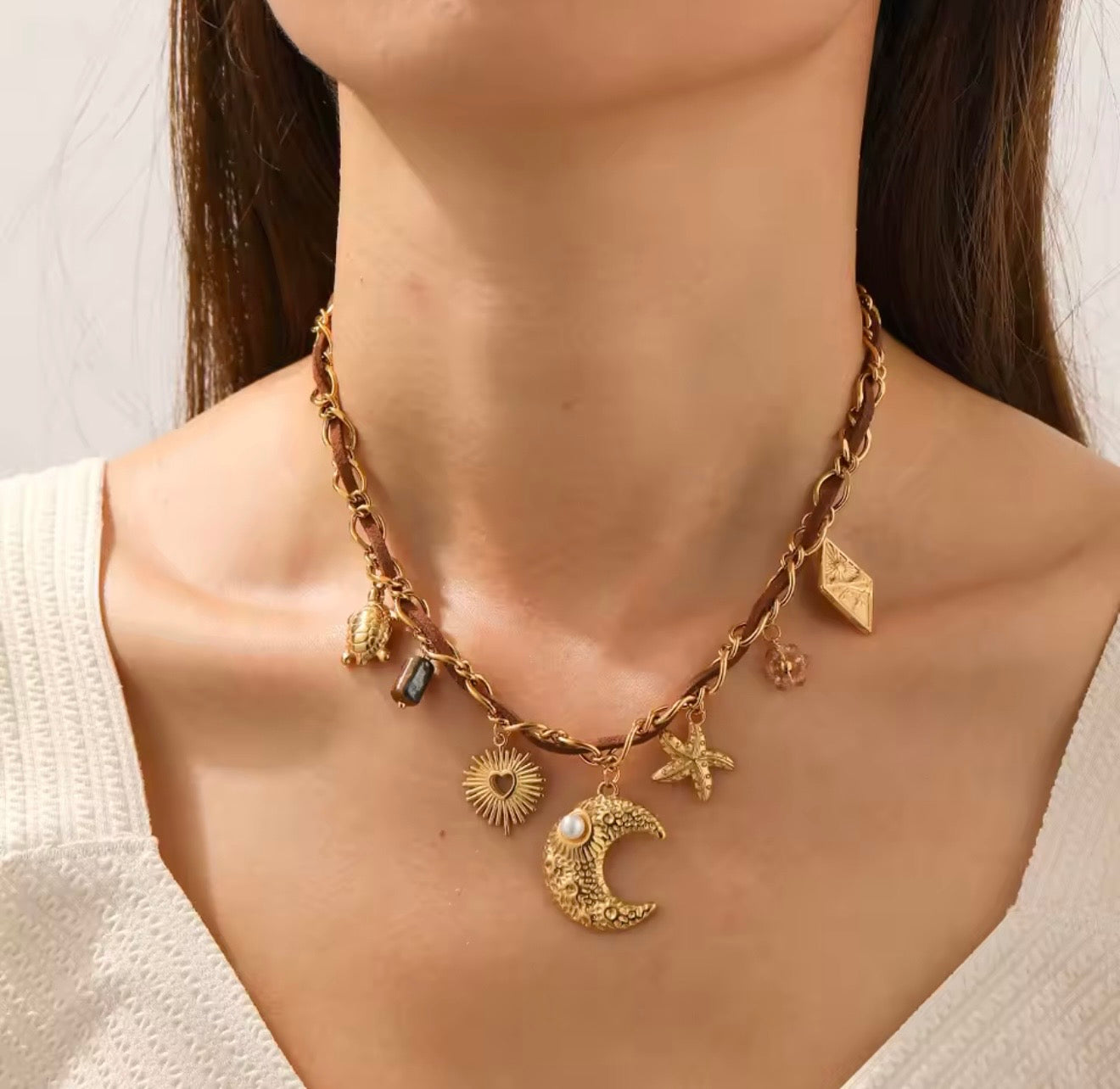 Collares  de acero inoxidable  con dijes de sol,luna,ojo,perlas,