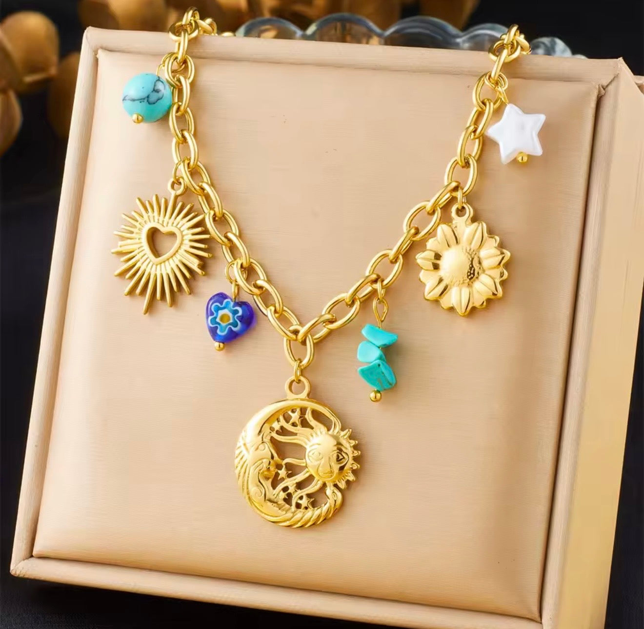 Collares  de acero inoxidable  con dijes de sol,luna,ojo,perlas,