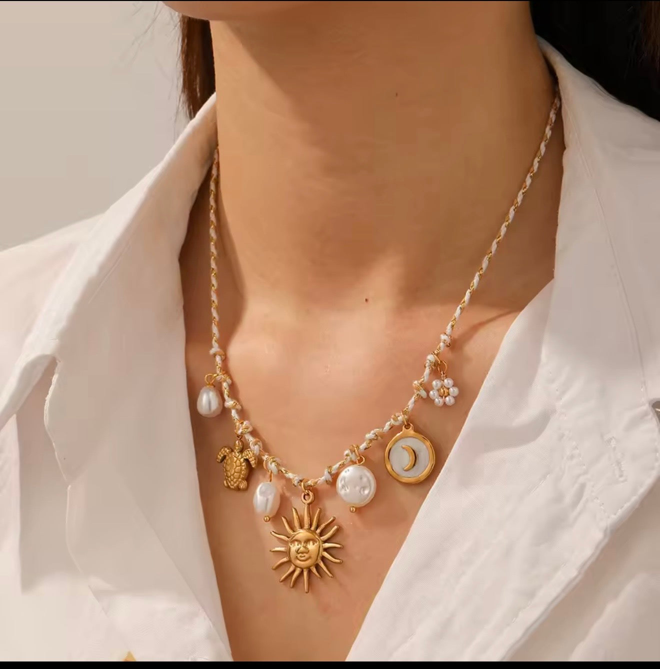 Collares  de acero inoxidable  con dijes de sol,luna,ojo,perlas,