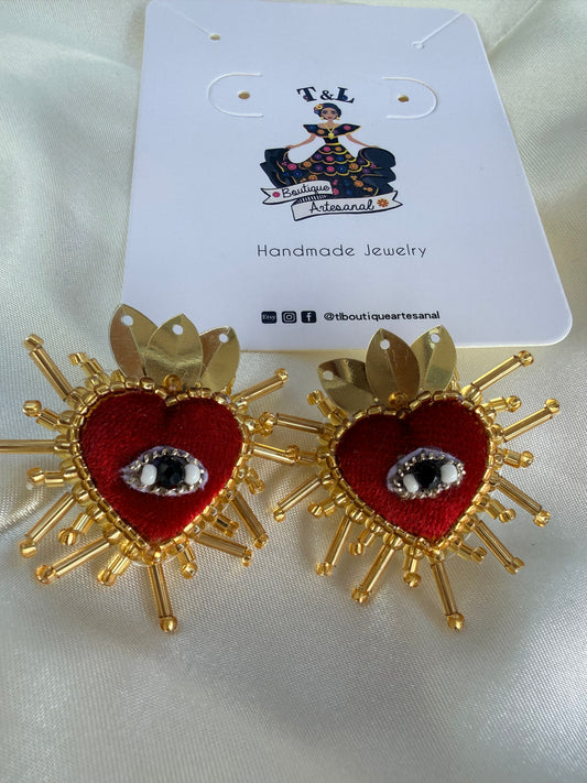 Aretes minis / milagritos / aretes artesanales /aretes minis ojo