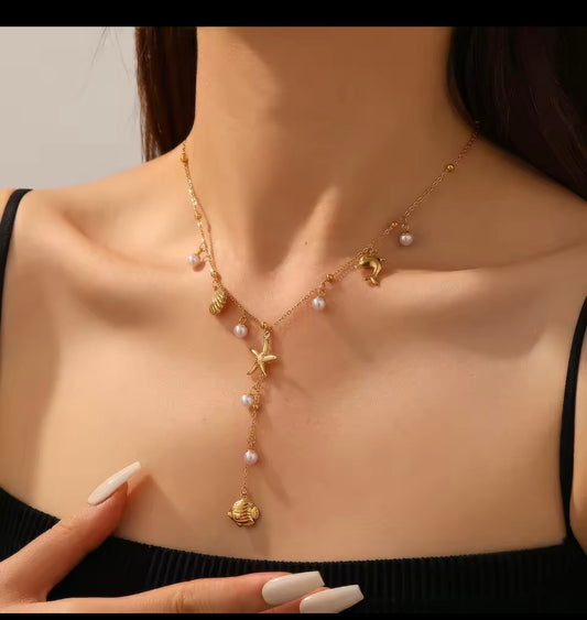 Collares  de acero inoxidable  con dijes de sol,luna,ojo,perlas,